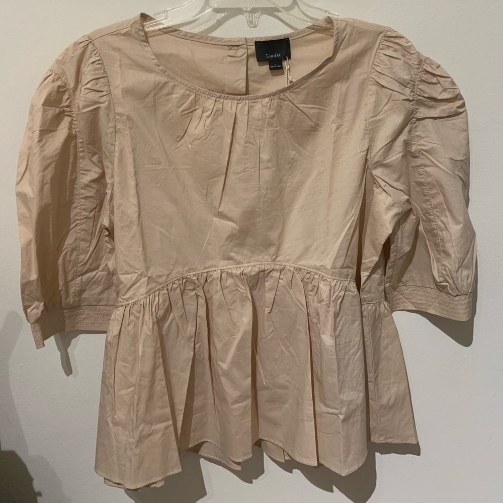 Lumiere peplum top. Brand new with tag.